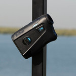 Tour V6 Shift Laser Rangefinder Black Variant attached to cart bar with BITE Magnetic Mount